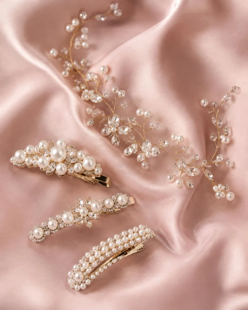 Pearl hair clips and a crystal hair vine on blush silk